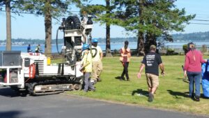 Equipment and people on lawn